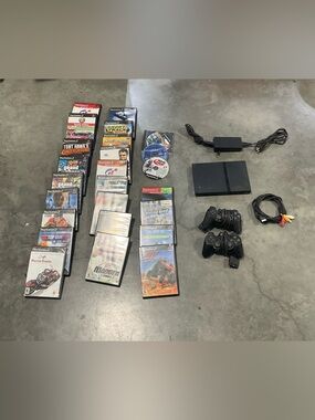 Sony Black PlayStation 2 Slim Console with 25 Games & Accessories
